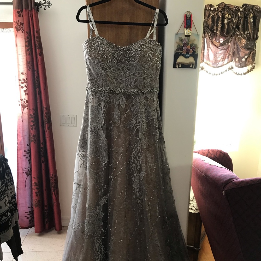 Size 12 Ivonne D dress. Brand new. Never worn.